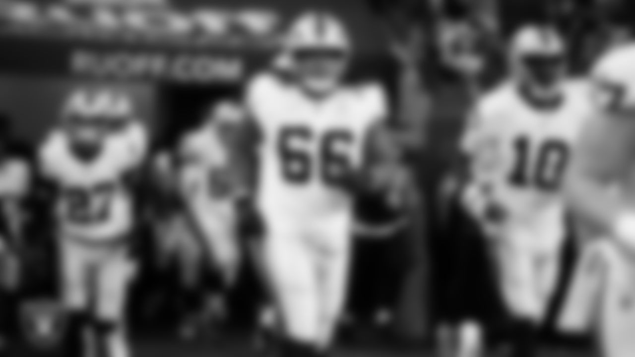 Las Vegas Raiders guard Dylan Parham (66) as the team is introduced onto the field before their regular season away game against the Indianapolis Colts at Lucas Oil Stadium.