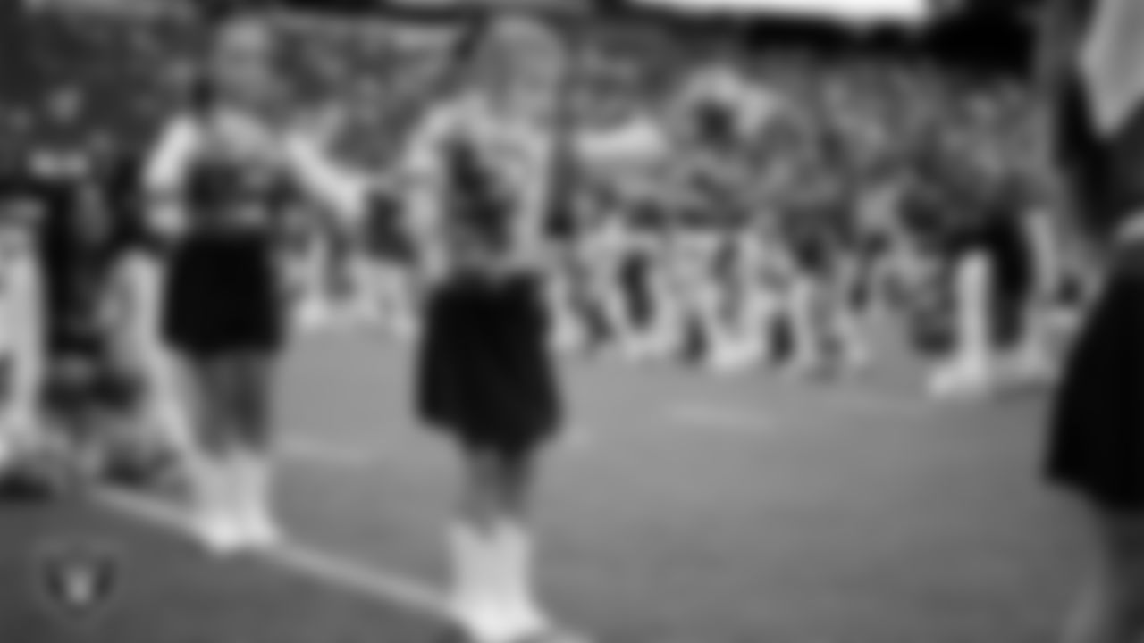 Junior Raiderettes perform on the field before the preseason home game against the San Francisco 49ers at Allegiant Stadium.
