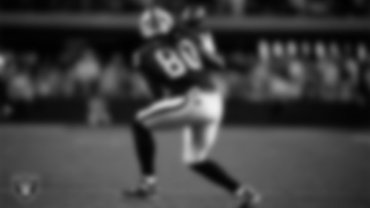 Las Vegas Raiders tight end Ian Thomas (80) goes for a catch during the regular season home game against the Dallas Cowboys at Allegiant Stadium.