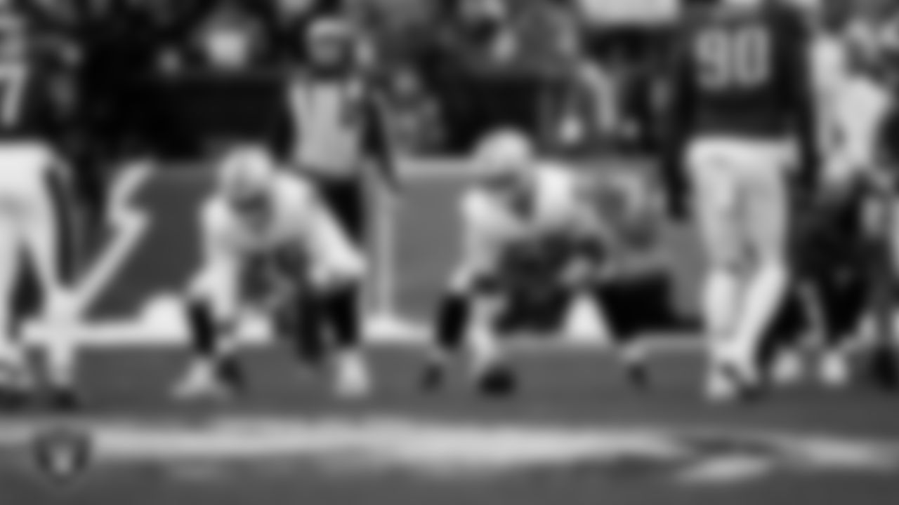 Las Vegas Raiders guard Caleb Rogers (76) and guard Alex Cappa (65) line up before the snap during the regular season away game against the Philadelphia Eagles at Lincoln Financial Field.