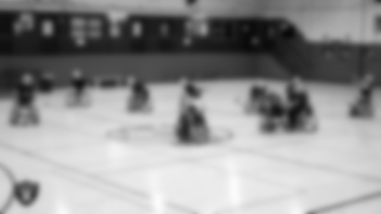 Members of the Las Vegas Raiders take part in a City of Las Vegas Wheelchair Football League practice at Dula Community Center.