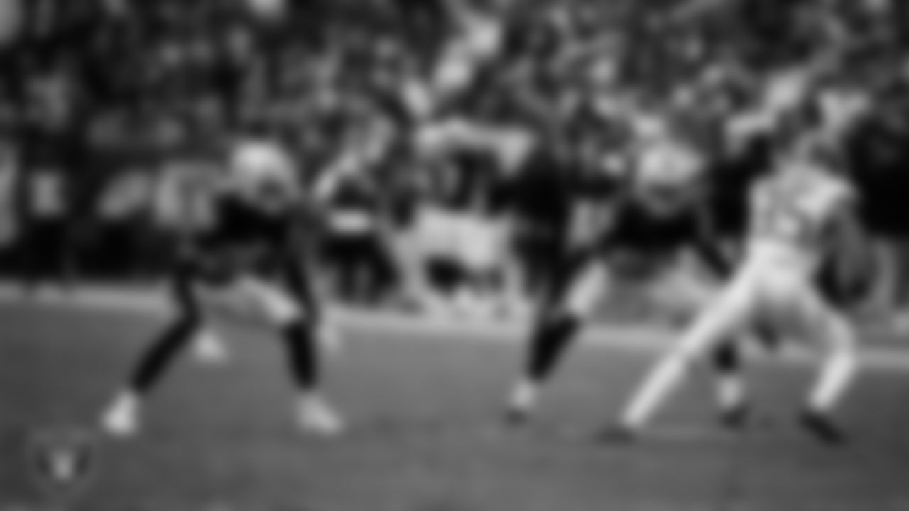 Las Vegas Raiders cornerback Darien Porter (26) and cornerback Decamerion Richardson (25) defend during the regular season home game against the Tennessee Titans at Allegiant Stadium.