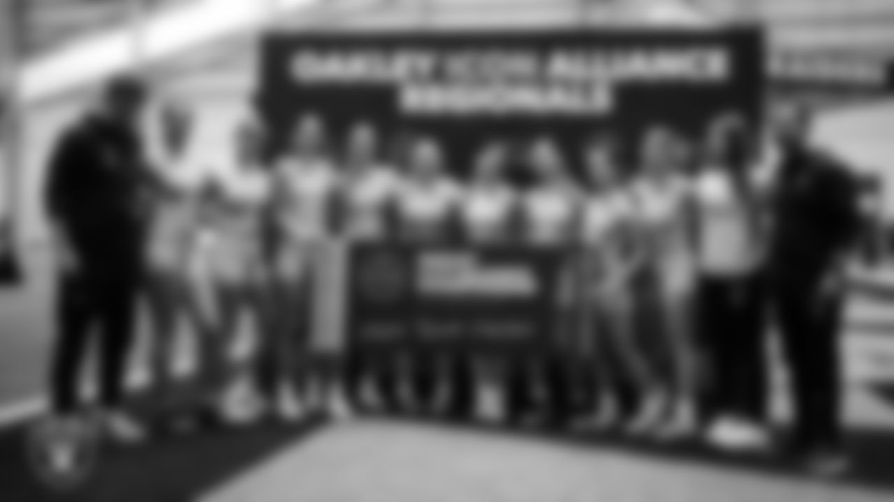 The Bad Rabbits flag football team poses for a photo after winning their way to the 2026 Oakley Icon Alliance Championship.