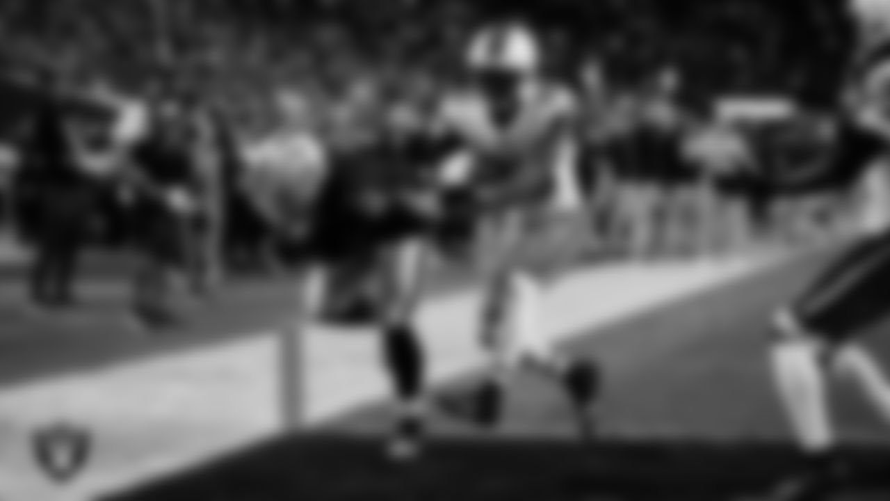 Las Vegas Raiders running back Ashton Jeanty (2) runs after making a 5-yard touchdown catch during the regular season home game against the Cleveland Browns at Allegiant Stadium.