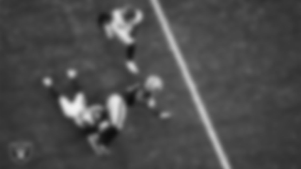 Las Vegas Raiders tight end Ian Thomas (80) runs after making a catch during the regular season home game against the Denver Broncos at Allegiant Stadium.