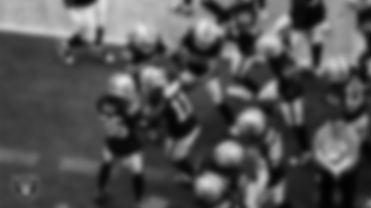 Las Vegas Raiders safety Jeremy Chinn (11) celebrates with teammates after intercepting a pass during the preseason home game against the San Francisco 49ers at Allegiant Stadium.