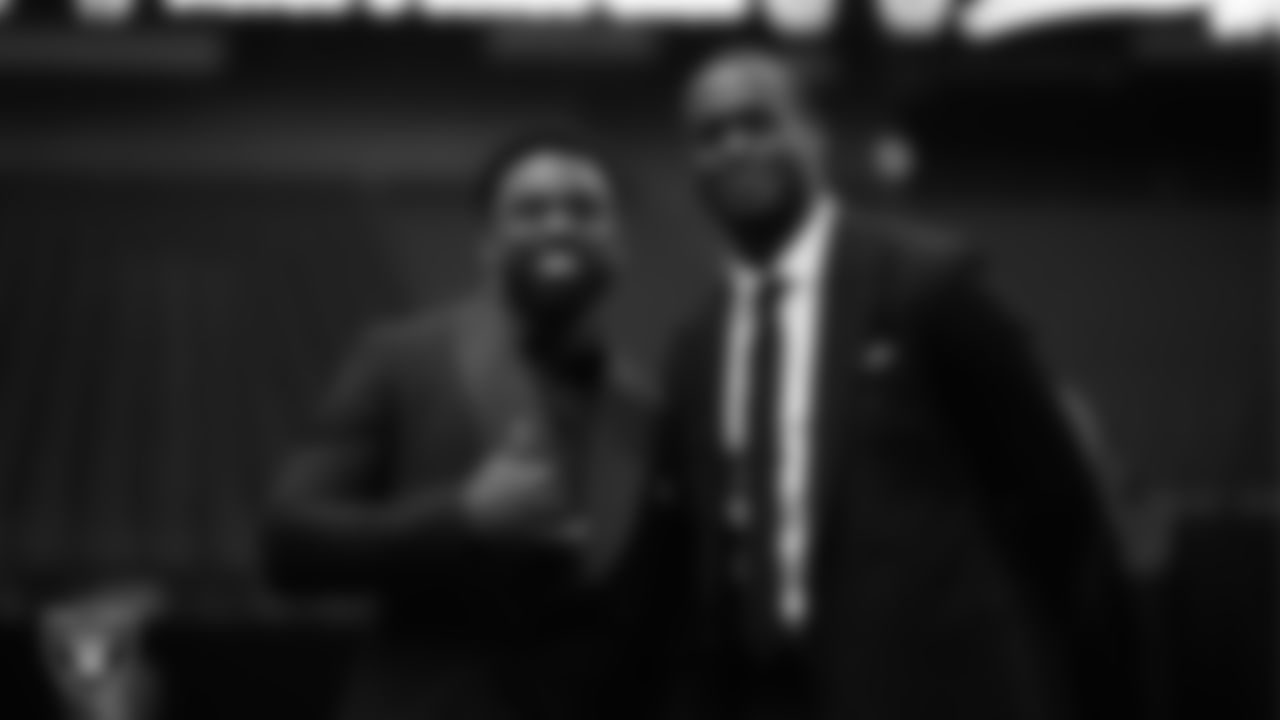 Las Vegas Raiders running back Raheem Mostert (31) and quarterback Geno Smith (7) pose for a photo during the second annual Silver & Black Gala hosted by The Raiders Foundation at Allegiant Stadium.