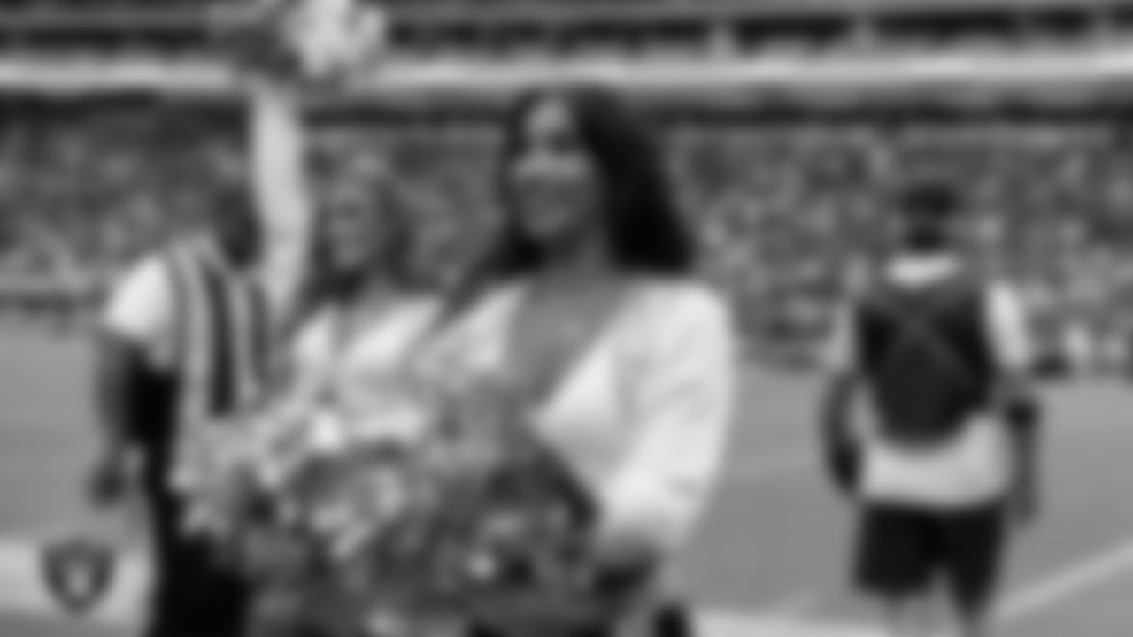 Raiderette Meekela on the sidelines during the preseason home game against the San Francisco 49ers at Allegiant Stadium.