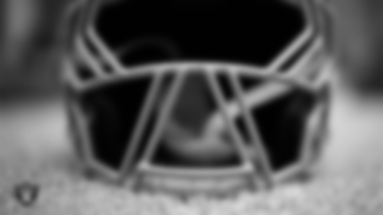 Las Vegas Raiders defensive end Maxx Crosby's (98) helmet on the field during practice at Intermountain Health Performance Center.