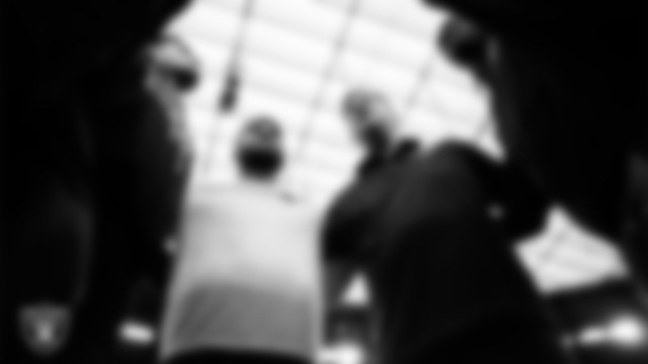 The Las Vegas Raiders linebackers huddle before the regular season home game against the New York Giants at Allegiant Stadium.