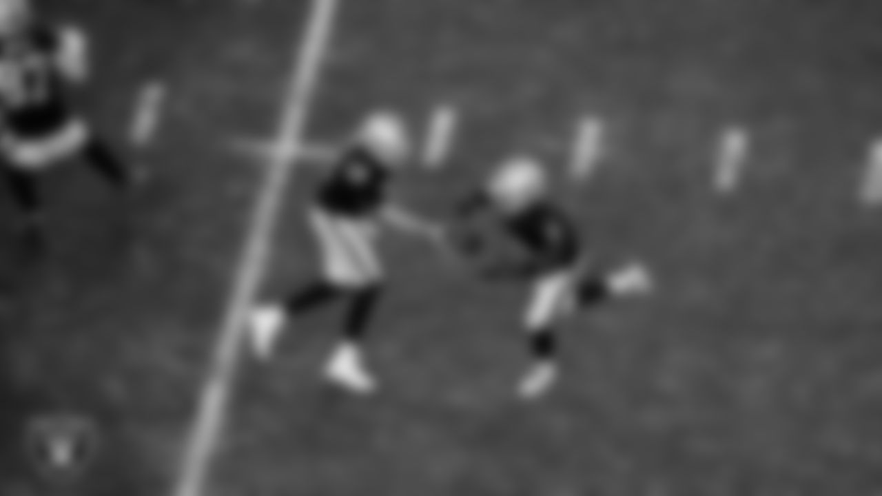 Las Vegas Raiders quarterback Aidan O'Connell (12) and running back Ashton Jeanty (2) during the regular season home game against the Kansas City Chiefs at Allegiant Stadium.