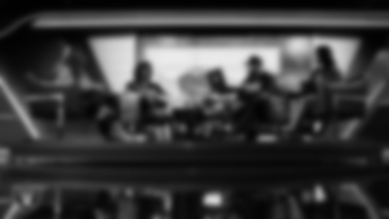 Las Vegas Raiders cornerback Darien Porter (26) works with representatives from The Shade Tree and designers to design cleats for My Cause My Cleats in Cox Studios at Intermountain Health Performance Center.