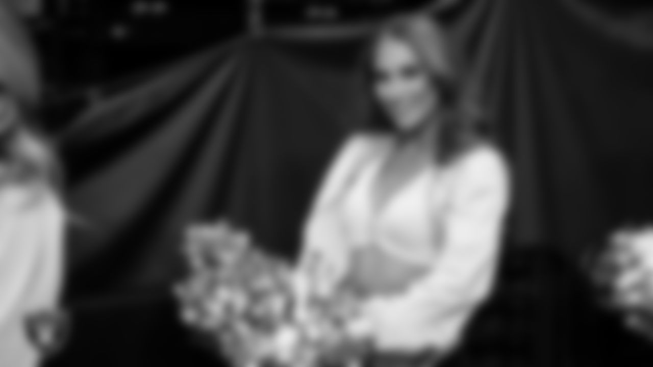 Raiderette Madisyn walks through the tunnel before the regular season home game against the Kansas City Chiefs at Allegiant Stadium.