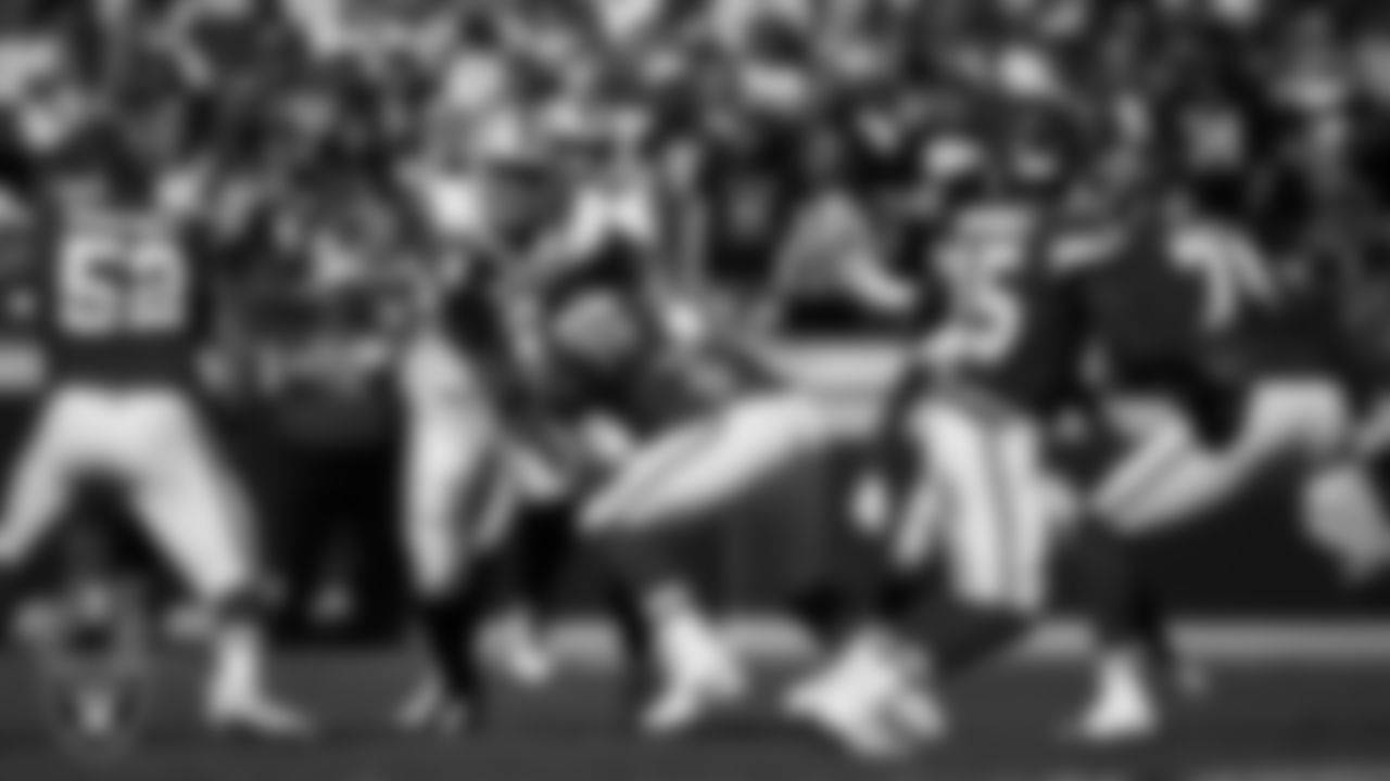 Las Vegas Raiders defensive tackle Leki Fotu (95) pressures the quarterback during the regular season away game against the Kansas City Chiefs at GEHA Field at Arrowhead Stadium.