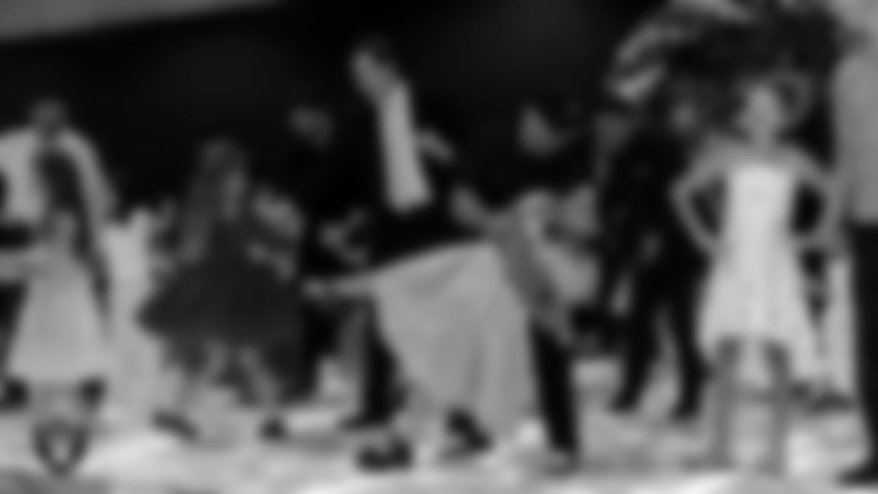 Attendees learn a dance during the Valentine's Day Dance at The Studio.