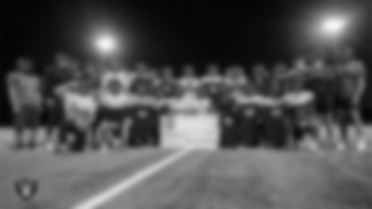 The Virgin Valley High School football team poses for a photo during practice at Virgin Valley High School.
