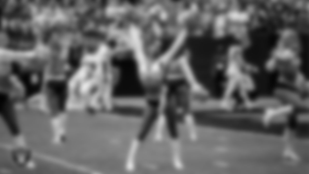 Raiderette Raegen during player introductions before the regular season home game against the Tennessee Titans at Allegiant Stadium.