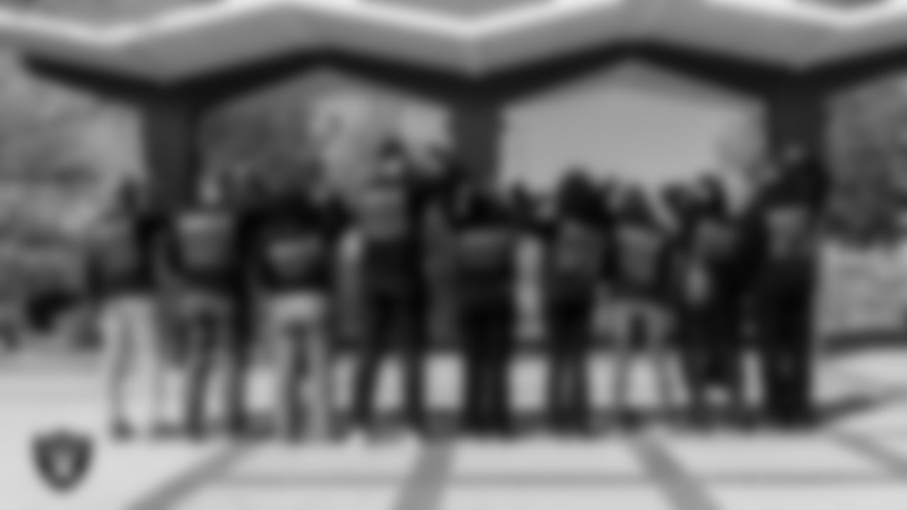 Attendees pose for a photo at Legacy Park during the Historic Westside Tour.