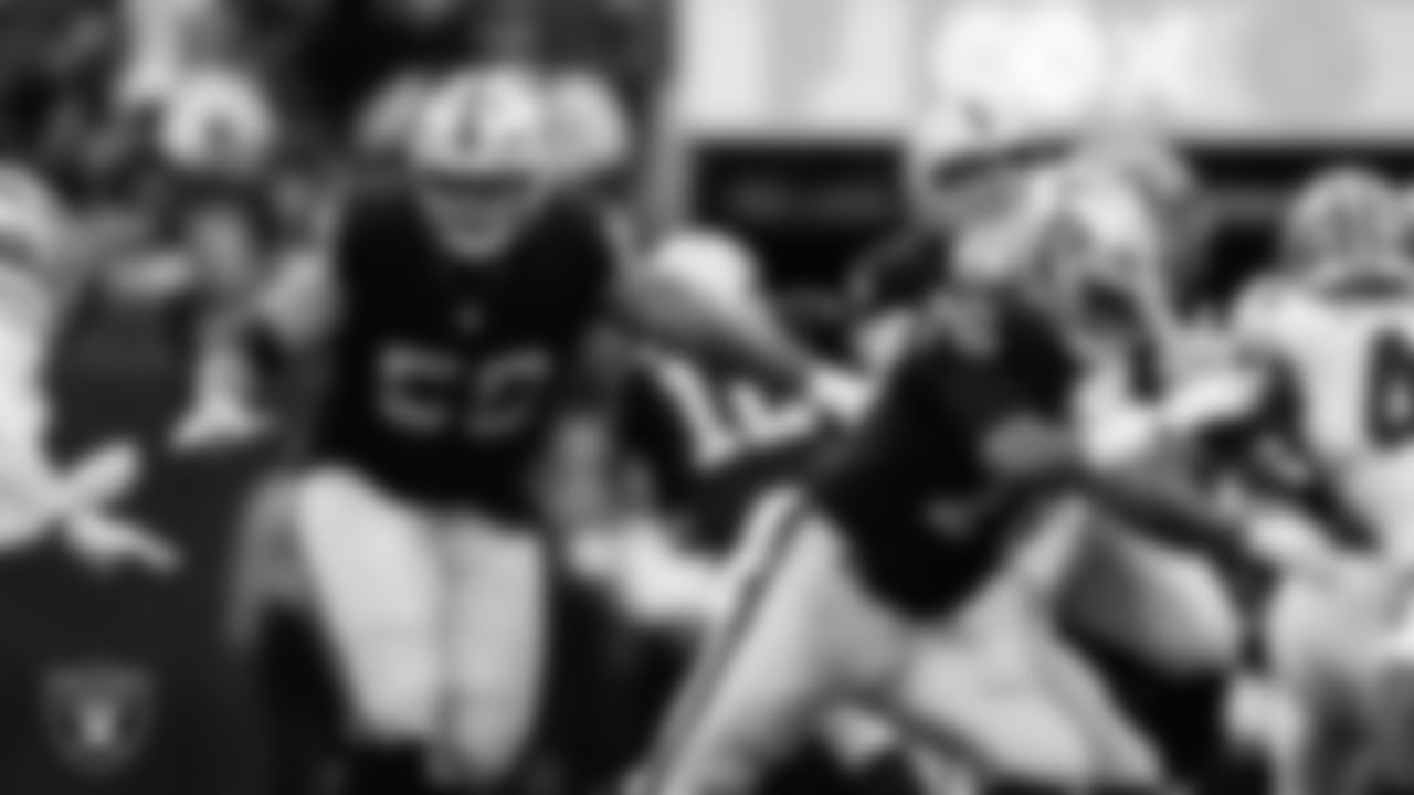 Las Vegas Raiders guard Atonio Mafi (56) and guard Caleb Rogers (76) during the preseason home game against the San Francisco 49ers at Allegiant Stadium.
