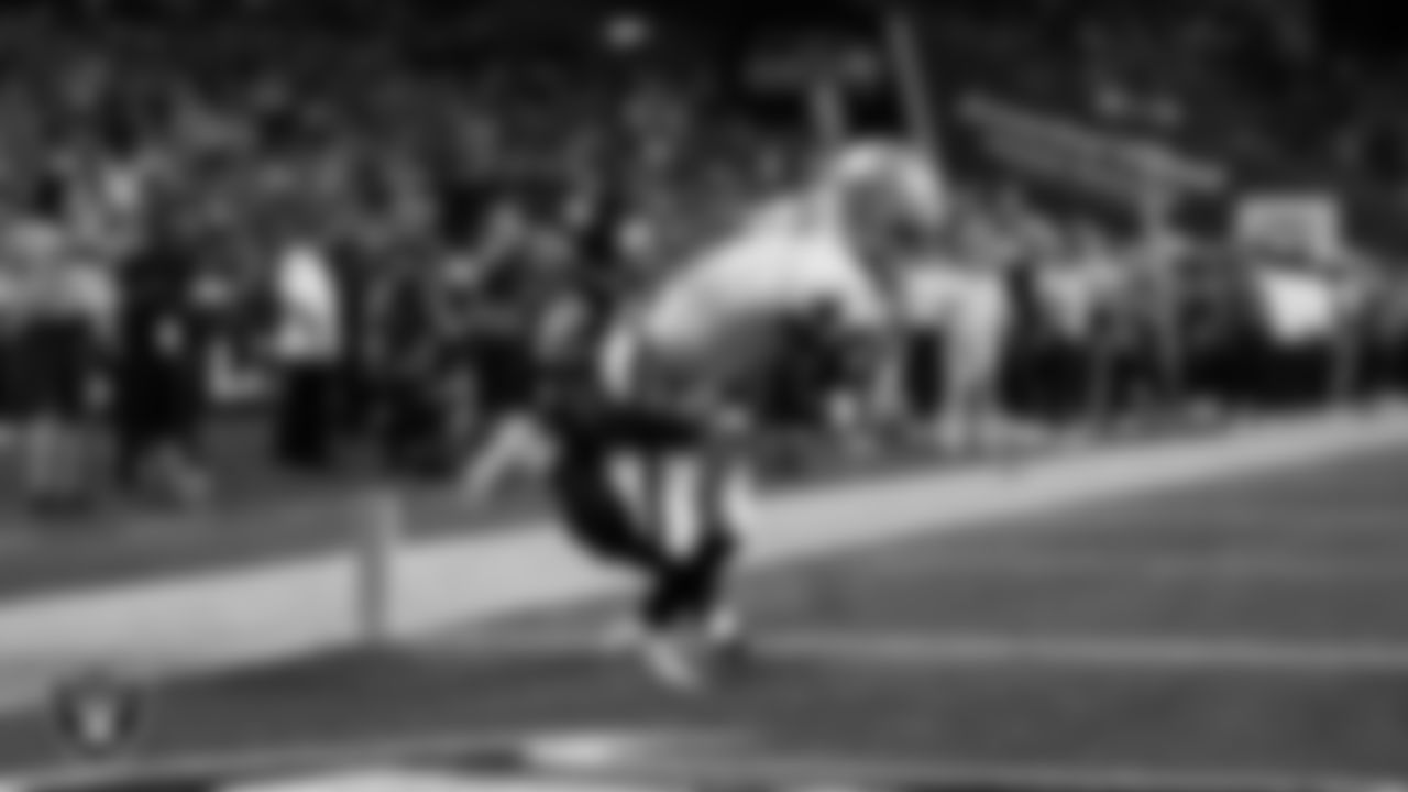 Las Vegas Raiders wide receiver Shedrick Jackson (4) runs after making a 41-yard touchdown catch during the preseason away game against the Seattle Seahawks at Lumen Field.