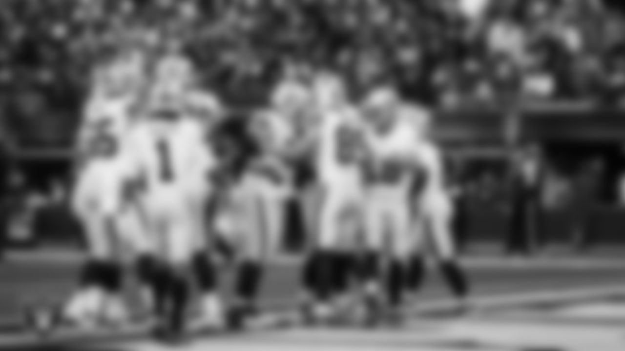 Las Vegas Raiders tight end Brock Bowers (89) celebrates with teammates after making a 6-yard touchdown catch during the regular season away game against the Los Angeles Chargers at SoFi Stadium.