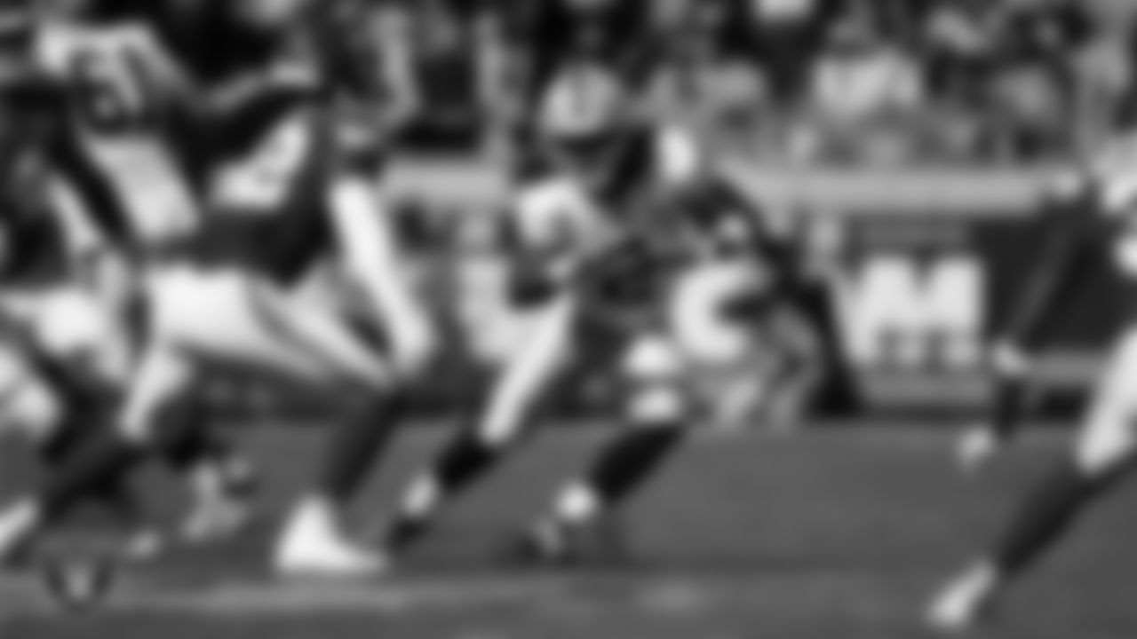 Las Vegas Raiders running back Ashton Jeanty (2) rushes during the regular season away game against the Kansas City Chiefs at GEHA Field at Arrowhead Stadium.