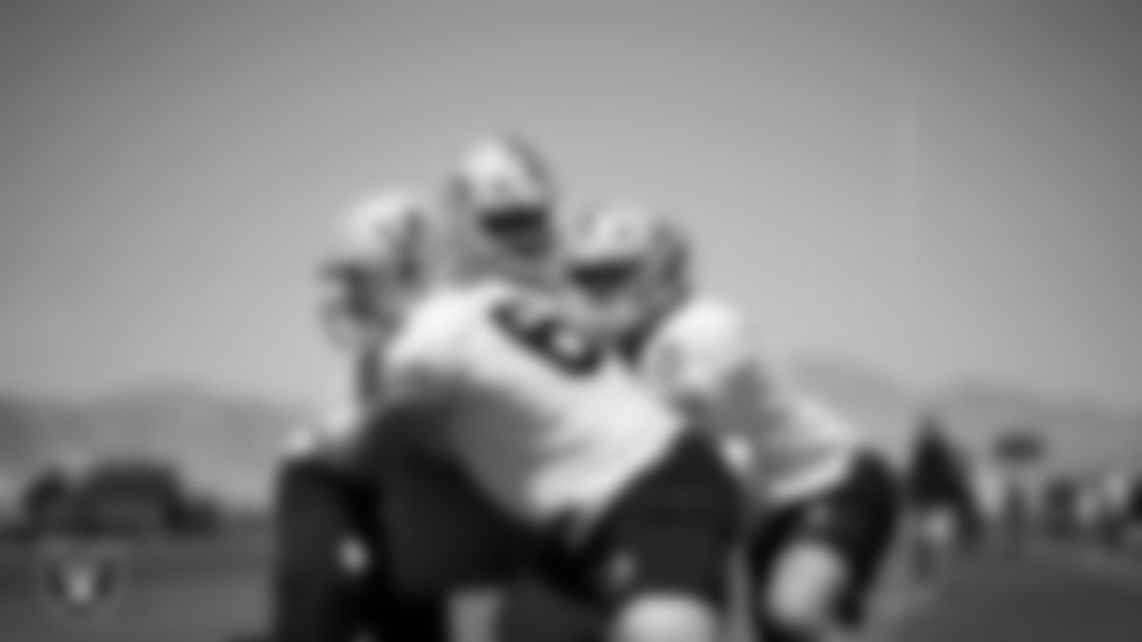 Las Vegas Raiders center Will Putnam (67), guard Caleb Rogers (76) and tackle Parker Clements (70) on the field for mandatory minicamp at Intermountain Health Performance Center.