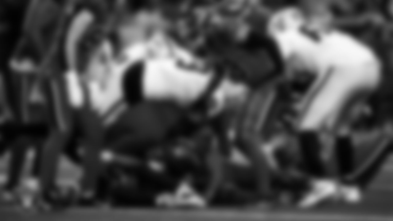 Las Vegas Raiders defensive end Tyree Wilson (9) makes a tackle during the regular season away game against the Houston Texans at NRG Stadium.