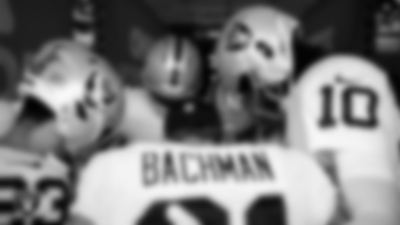 The Las Vegas Raiders returners huddle in the tunnel before the regular season away game against the Kansas City Chiefs at GEHA Field at Arrowhead Stadium.