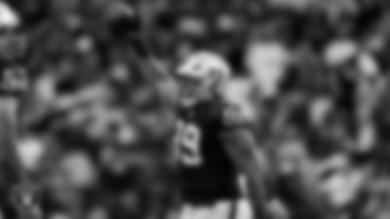 Las Vegas Raiders defensive tackle Thomas Booker IV (99) celebrates after recovering a fumble during the regular season home game against the Tennessee Titans at Allegiant Stadium.