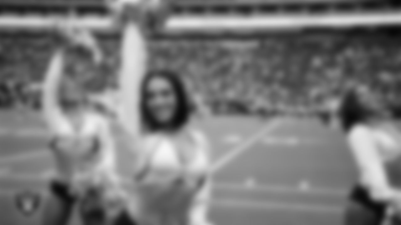 Raiderette Kylie on the sidelines during a 2025 Training Camp mock game at Allegiant Stadium.