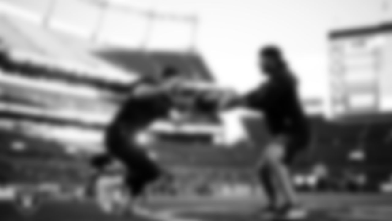 Las Vegas Raiders defensive end Maxx Crosby (98) warming up before the regular season away game against the Denver Broncos at Empower Field at Mile High.