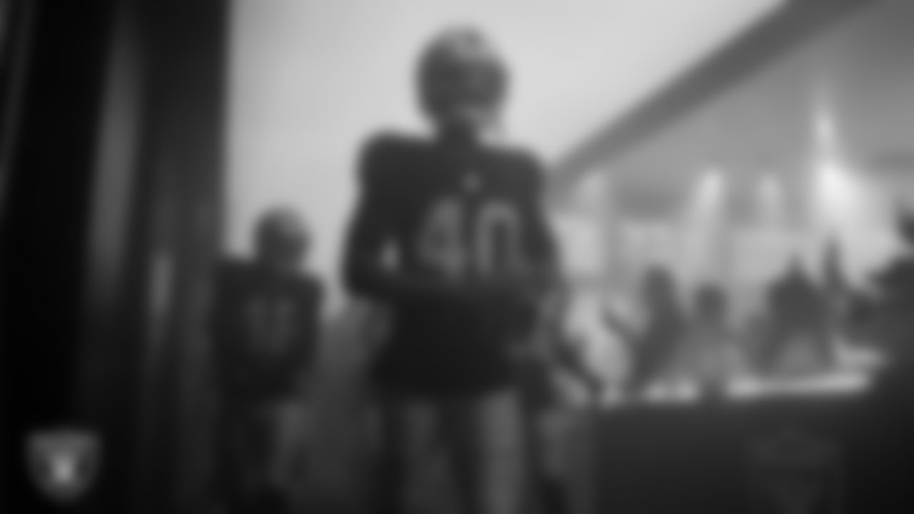 Las Vegas Raiders safety JT Woods (40) walks down the tunnel before the preseason home game against the San Francisco 49ers at Allegiant Stadium.
