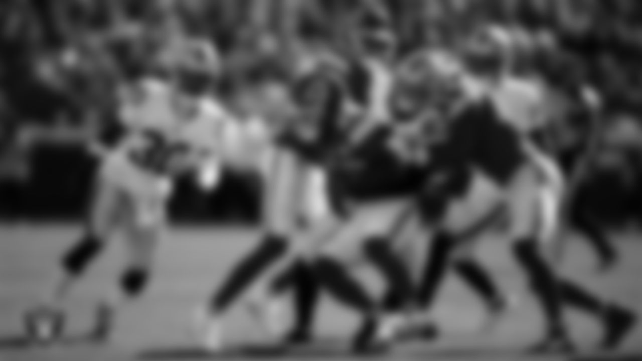 Las Vegas Raiders safety Tristin McCollum (27) makes a tackle during the regular season away game against the Kansas City Chiefs at GEHA Field at Arrowhead Stadium.