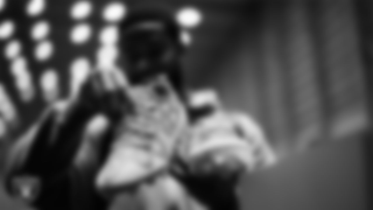 Las Vegas Raiders safety Jeremy Chinn (11) unboxes his custom cleats for the NFL's My Cause My Cleats initiative at Intermountain Health Performance Center.