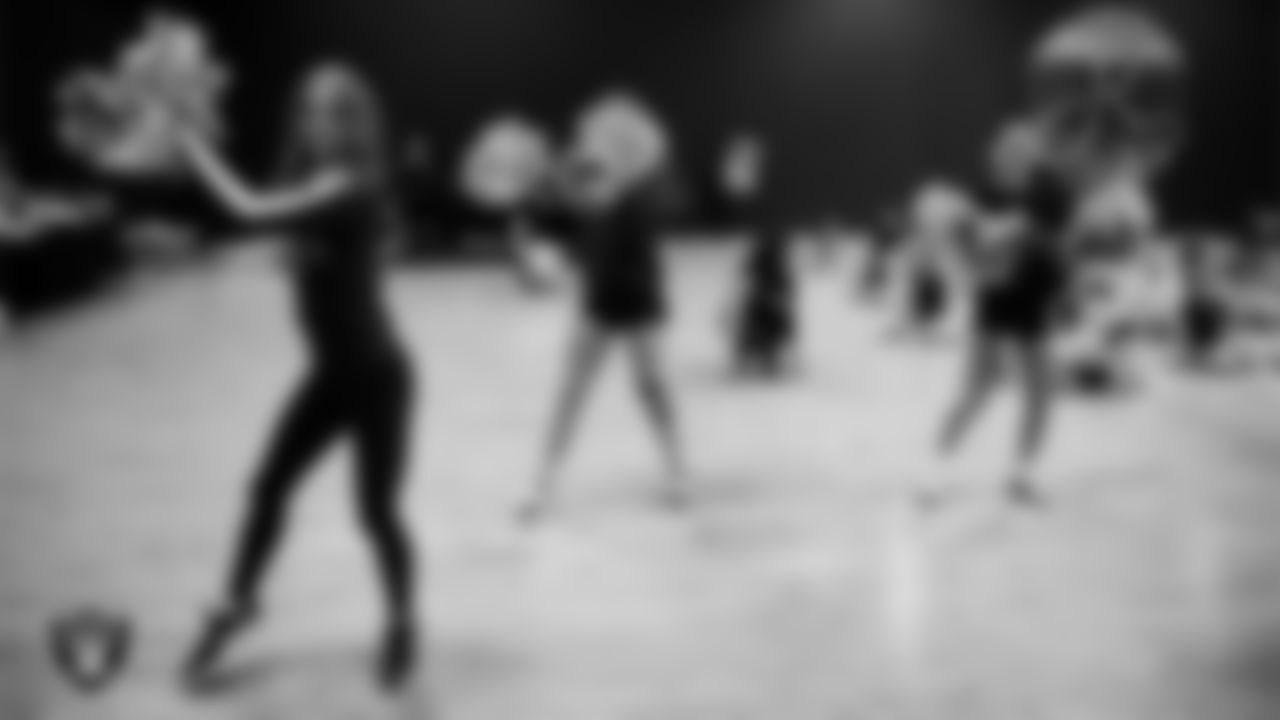 Raiderette Audrey with dancers during day two of summer camp at The Studio.