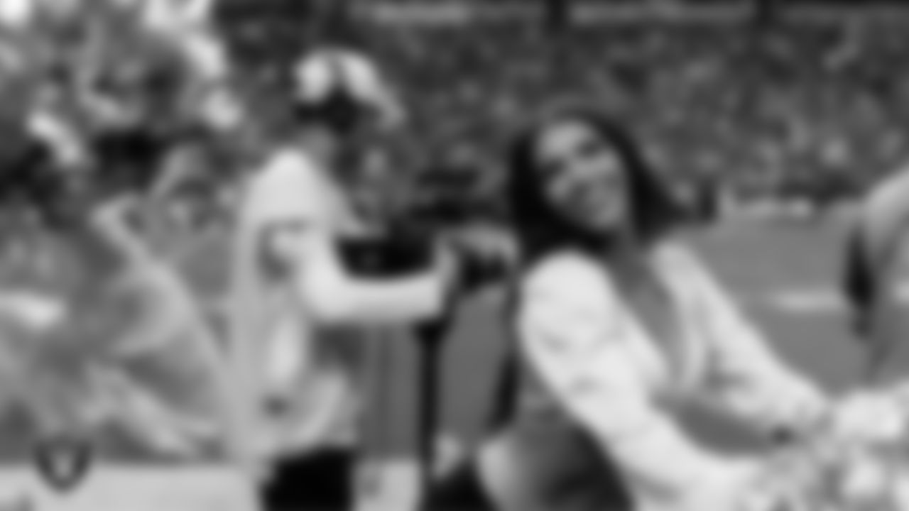Raiderette Ashtin on the sidelines during the regular season home game against the Denver Broncos at Allegiant Stadium.