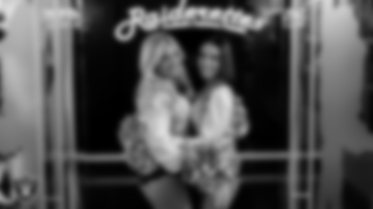 Raiderettes Pip and Kylie in the locker room before the regular season home game against the Dallas Cowboys at Allegiant Stadium.