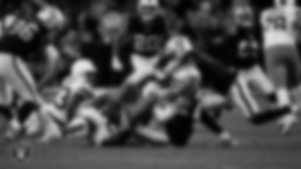 Las Vegas Raiders defensive end Maxx Crosby (98) makes a tackle during the regular season home game against the Cleveland Browns at Allegiant Stadium.
