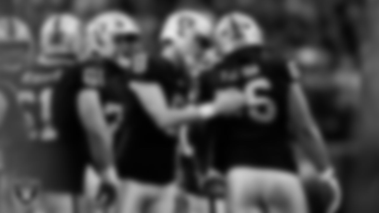 Las Vegas Raiders kicker Daniel Carlson (8) celebrates with guard Dylan Parham (66) after kicking a 41-yard field goal during the regular season home game against the Cleveland Browns at Allegiant Stadium.