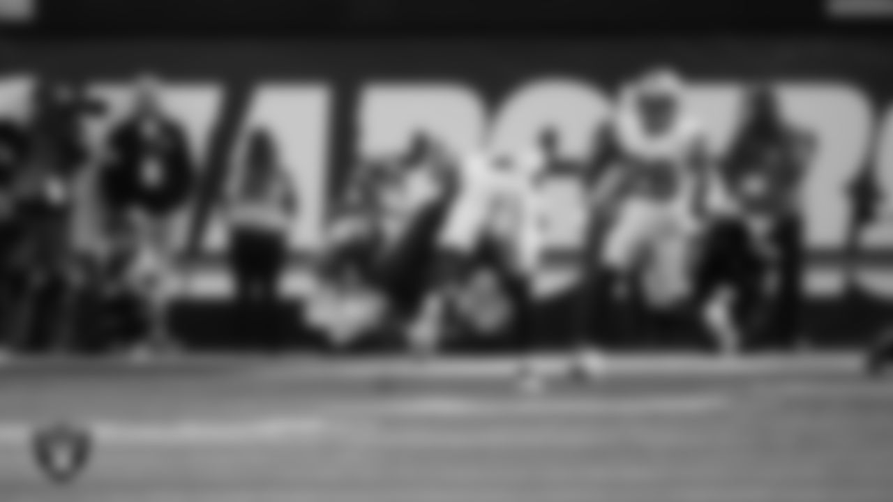 Las Vegas Raiders safety Jeremy Chinn (11) makes a tackle during the regular season away game against the Los Angeles Chargers at SoFi Stadium.