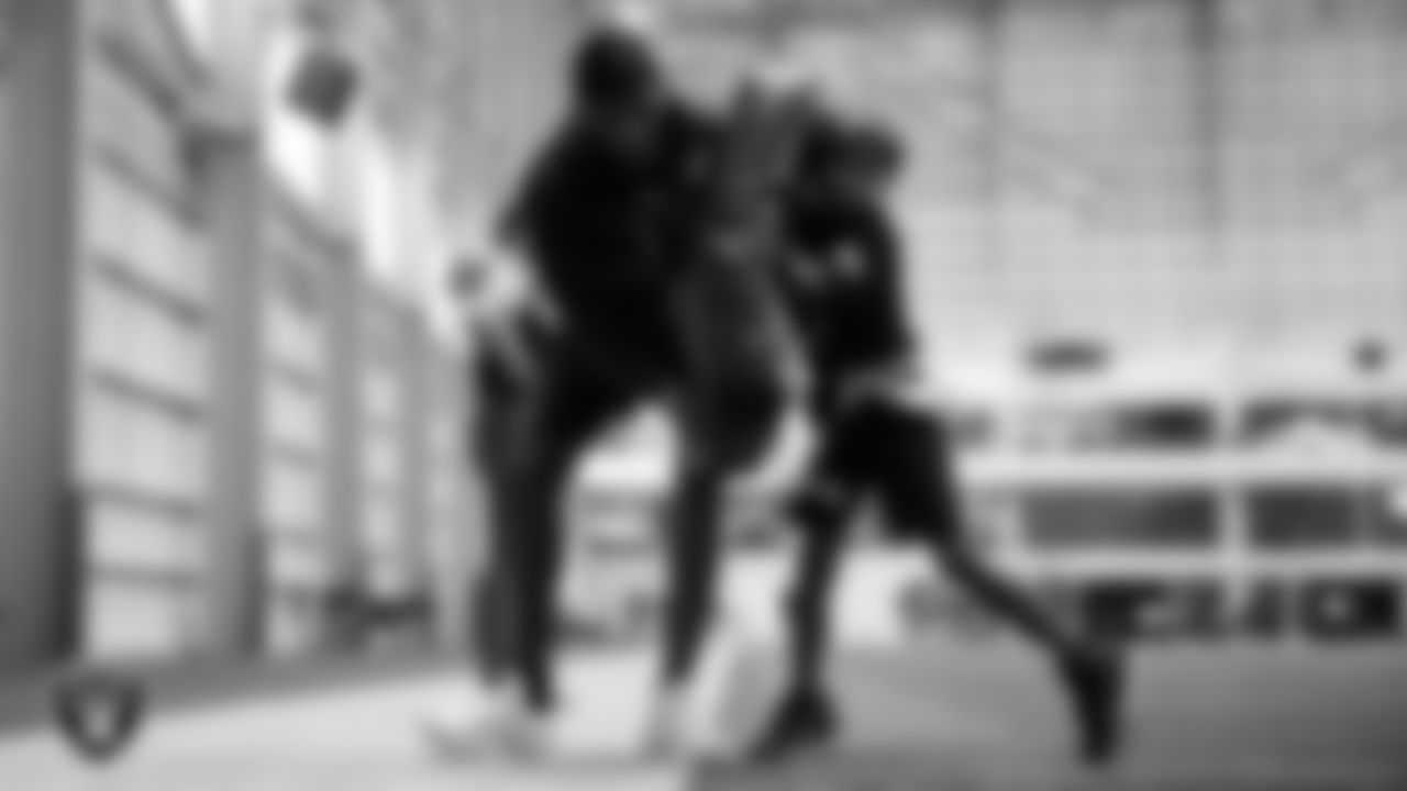 A member of the Jackson State University football team helps on a drill during a Raiders Junior Training Camp at Intermountain Health Performance Center.