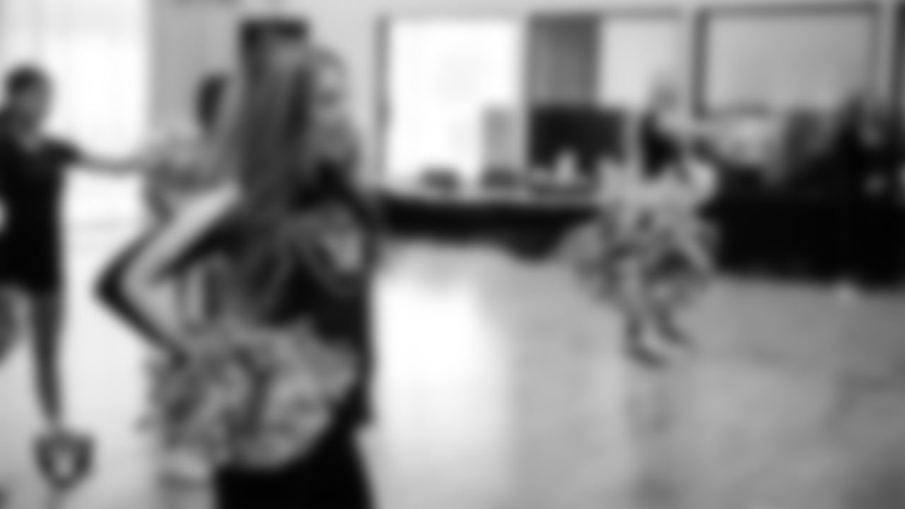 Raiderette Audrey rehearses with dancers during a teen intensive at The Studio.