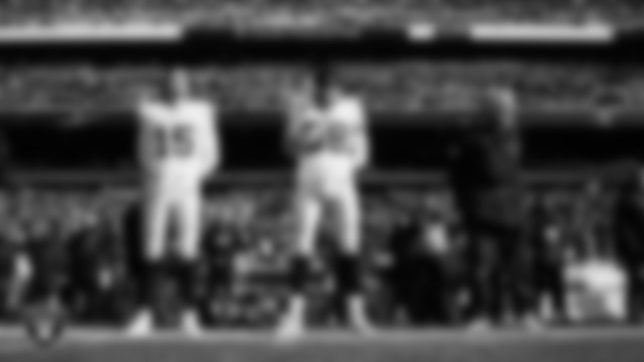 Las Vegas Raiders quarterback Kenny Pickett (15), defensive end Maxx Crosby (98) and Head Coach Pete Carroll during the national anthem before the regular season away game against the Philadelphia Eagles at Lincoln Financial Field.