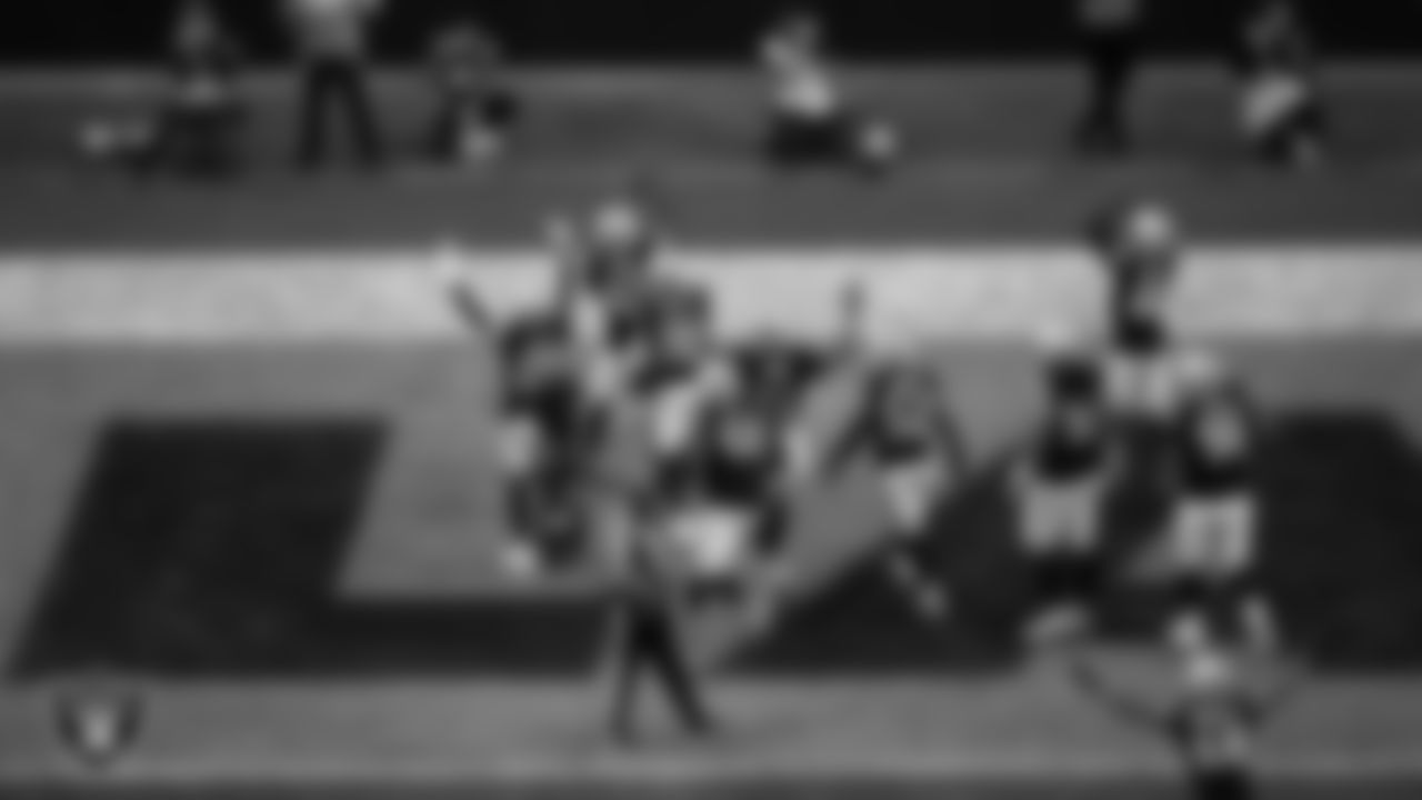 Las Vegas Raiders safety Isaiah Pola-Mao (20) celebrates with teammates after intercepting a pass during the regular season home game against the Jacksonville Jaguars at Allegiant Stadium.