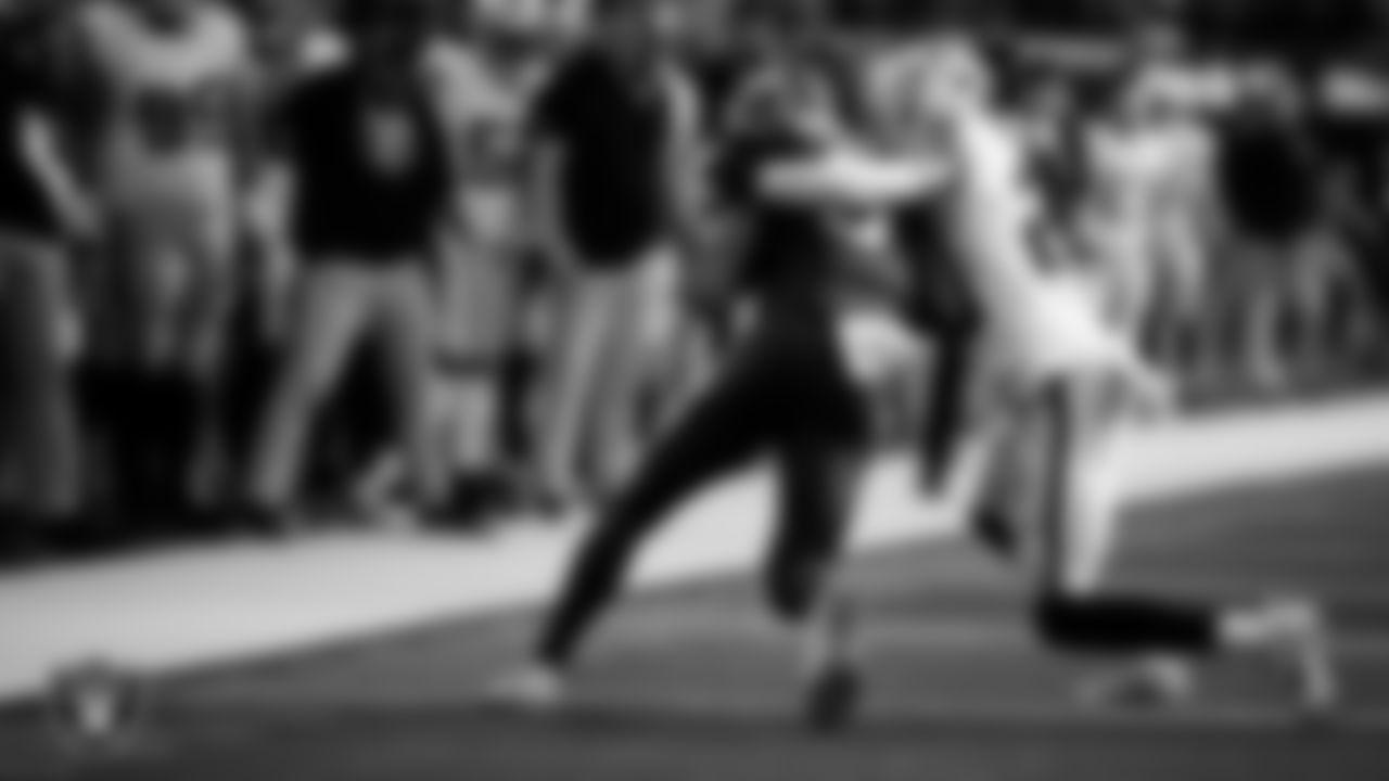 Las Vegas Raiders cornerback Darien Porter (26) makes a tackle during the regular season away game against the Los Angeles Chargers at SoFi Stadium.