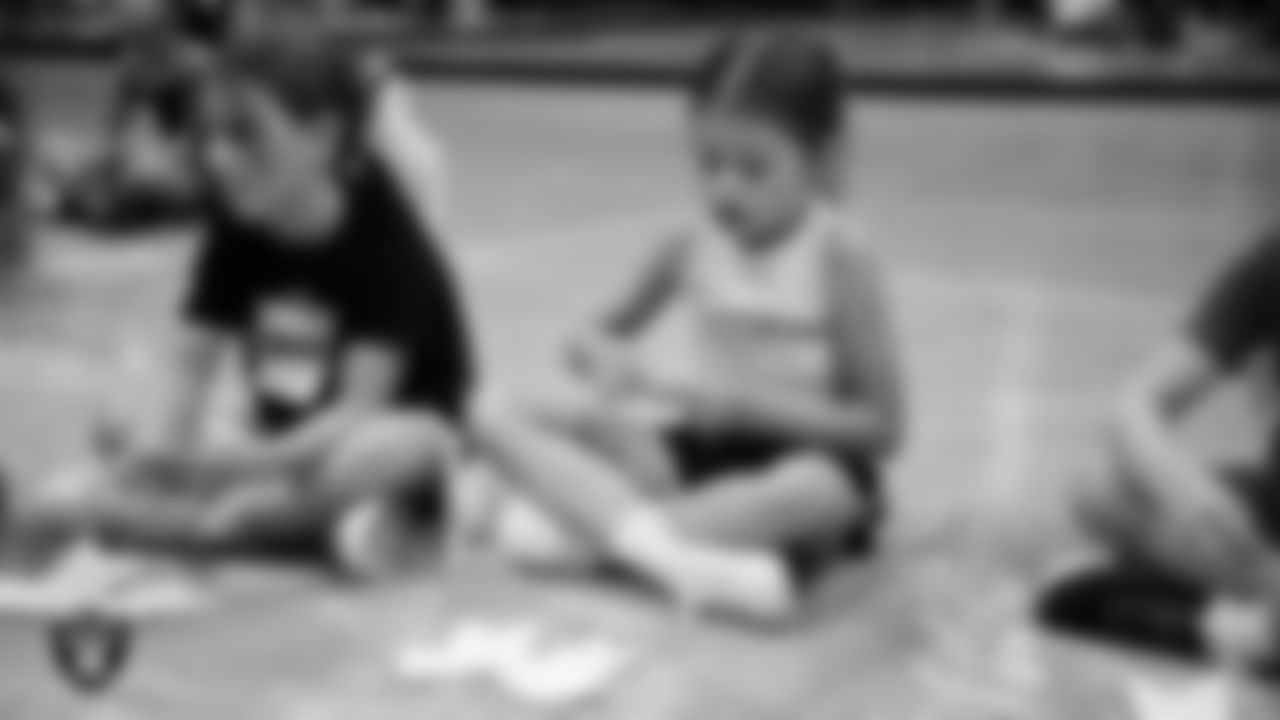Dancers decorate bows during day two of summer camp at The Studio.