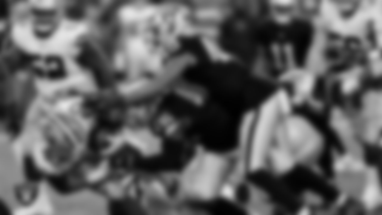 Las Vegas Raiders linebacker Devin White (45) and defensive end Charles Snowden (49) during the regular season home game against the Dallas Cowboys at Allegiant Stadium.