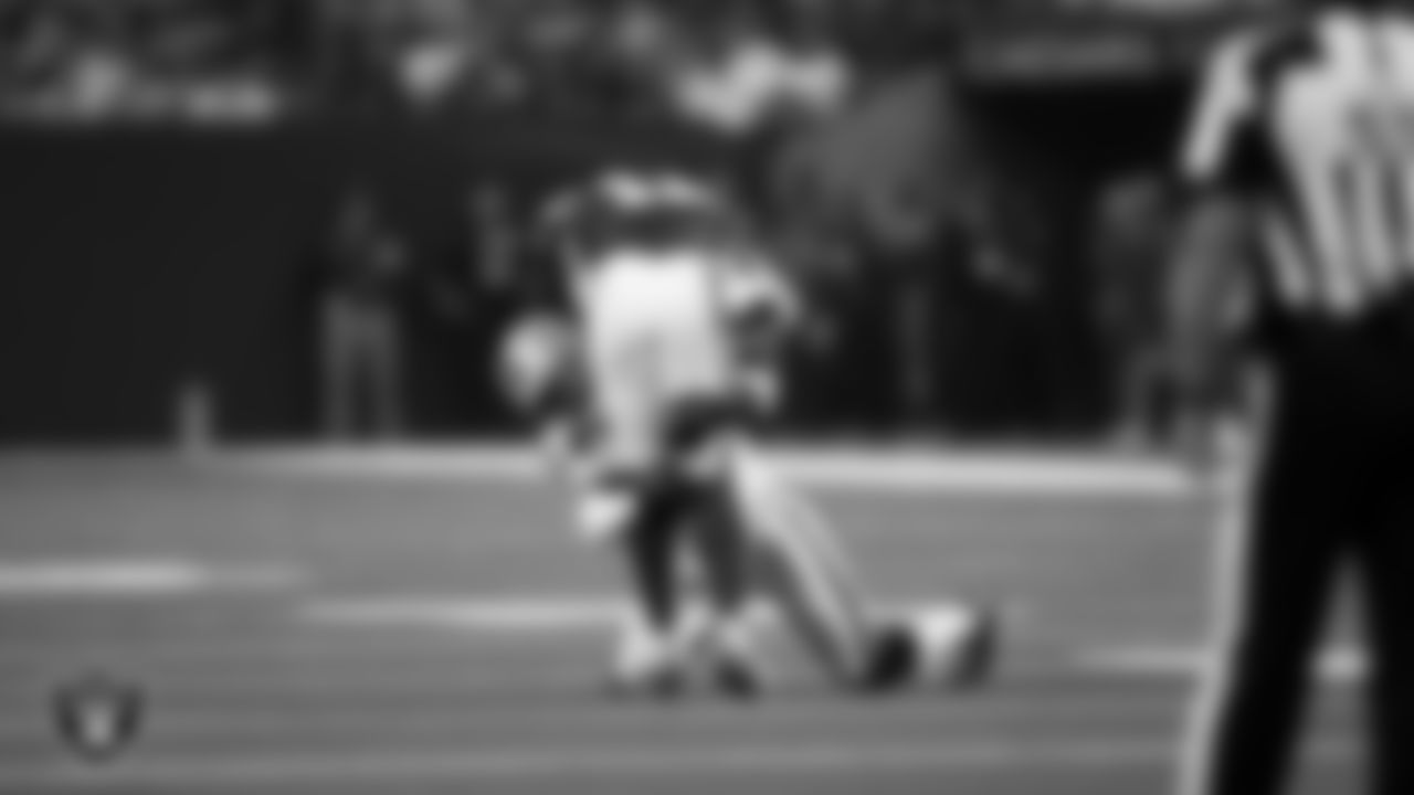 Las Vegas Raiders cornerback Darnay Holmes (30) makes a tackle during the regular season away game against the Indianapolis Colts at Lucas Oil Stadium.