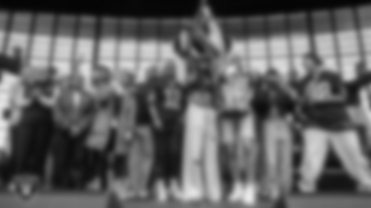 The Las Vegas Aces light the Al Davis Memorial Torch before the Las Vegas Raiders' regular season home game against the Tennessee Titans at Allegiant Stadium.